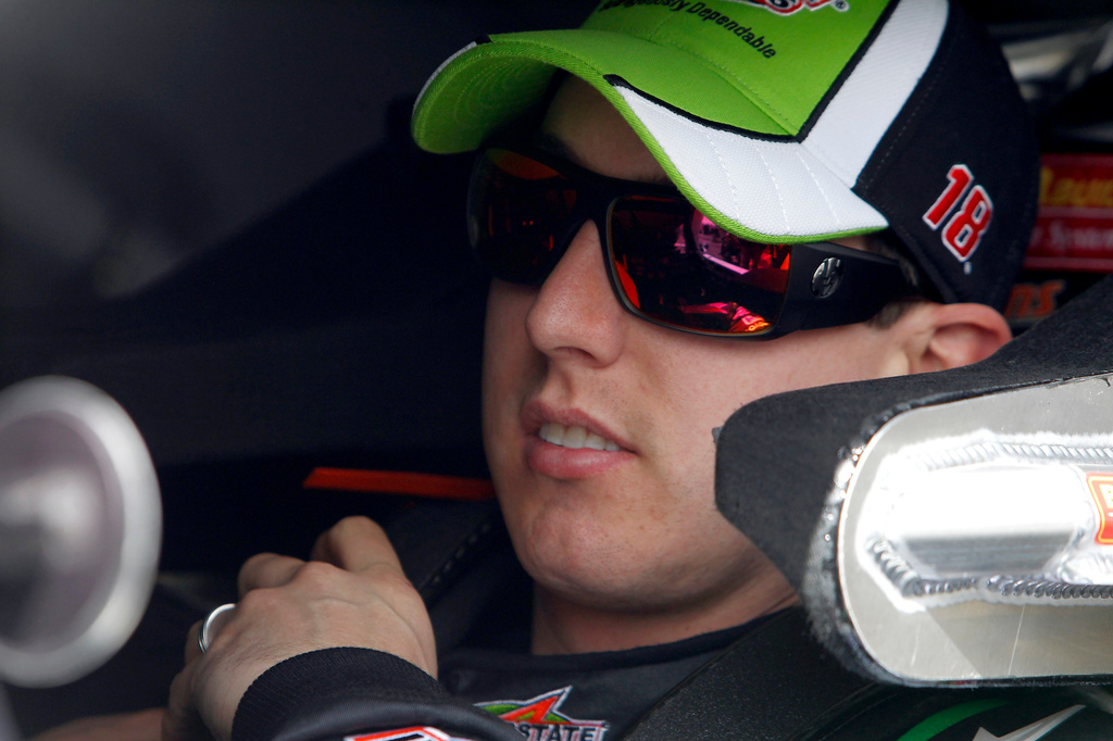 FILE - Driver Kyle Busch sits in his car prior to qualifying for the upcoming NASCAR Nationwide Series car race at Phoenix International Raceway Saturday, Feb. 26, 2011, in Avondale, Ariz. (AP Photo/Ross D. Franklin, File)