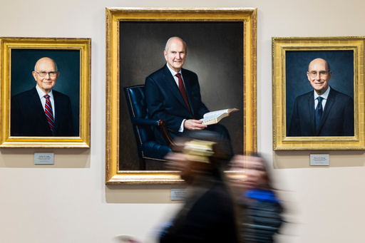 People pass by portraits of the previous church's First Presidency, from left, Dallin H. Oaks, first counselor in the First Presidency, Russell M. Nelson, 17th president and prophet of The Church of Jesus Christ of Latter-day Saints, and President Henry B. Eyring, second counselor in the First Presidency, before the Saturday morning session of the 195th Semiannual General Conference of The Church of Jesus Christ of Latter-day Saints in the Conference Center in Salt Lake City on Saturday, Oct. 4, 2025. (Isaac Hale/The Deseret News via AP) People pass by portraits of the previous church's First Presidency, from left, Dallin H. Oaks, first counselor in the First Presidency, Russell M. Nelson, 17th president and prophet of The Church of Jesus Christ of Latter-day Saints, and President Henry B. Eyring, second counselor in the First Presidency, before the Saturday morning session of the 195th Semiannual General Conference of The Church of Jesus Christ of Latter-day Saints in the Conference Center in Salt Lake City on Saturday, Oct. 4, 2025. (Isaac Hale/The Deseret News via AP)