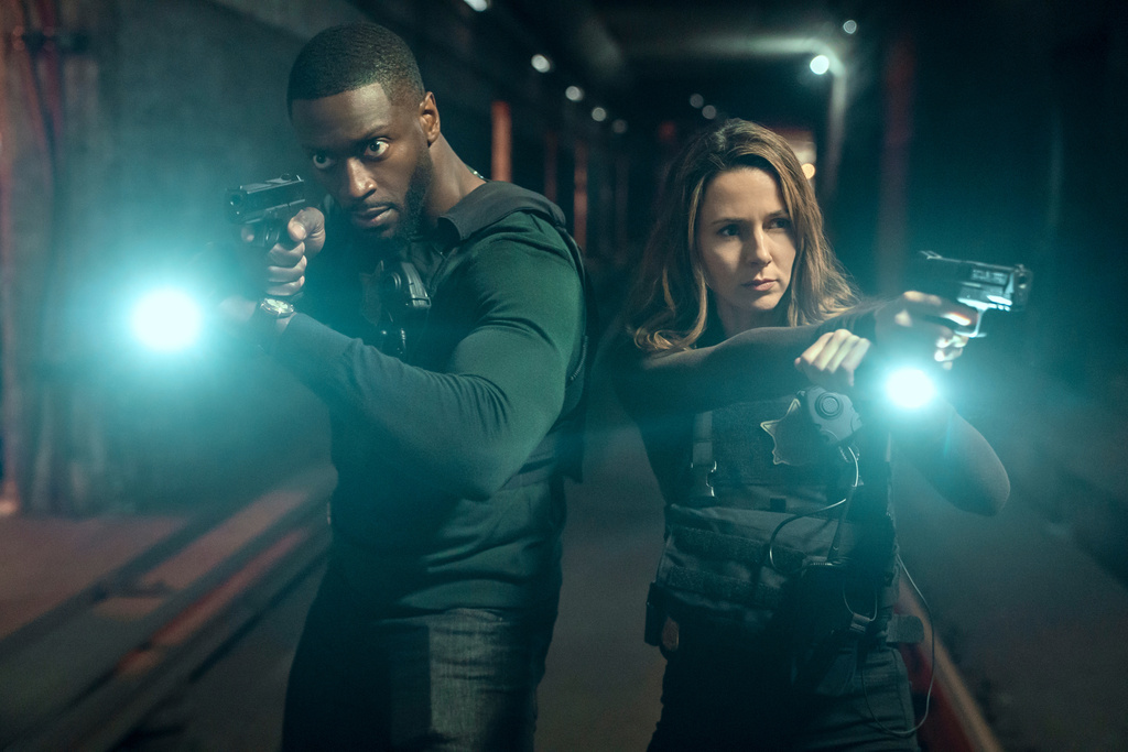 This image released by Prime Video shows Aldis Hodge as Alex Cross, left, and Alona Tal as Kayla Craig from the series "Cross." (Ian Watson/Prime Video via AP)