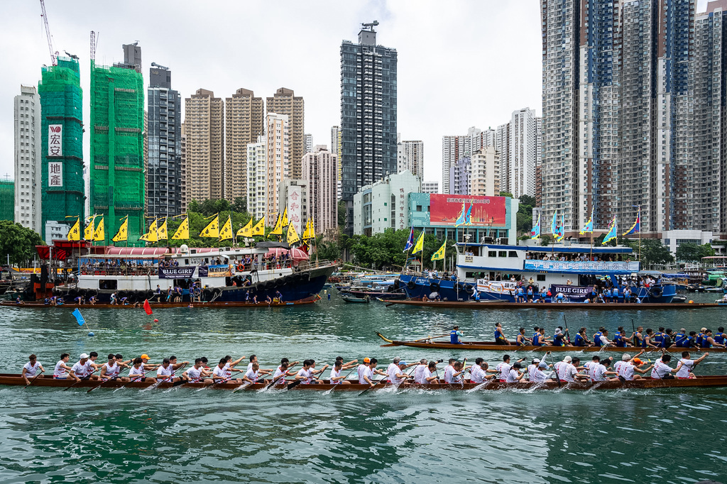 Competitors take part in the Aberdeen Dragon Boat Race to celebrate the Dragon Boat Festival in Hong Kong, Friday, June 19, 2026. (AP Photo/Chan Long Hei)