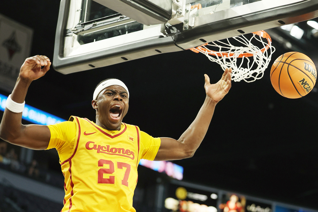 Iowa State guard Killyan Toure (27) dunks the ball during the first half of an NCAA college basketball against against Creighton Tuesday, Nov. 25, 2025, in Las Vegas. (AP Photo/Ronda Churchill)