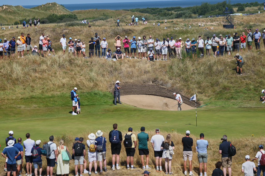 Tommy Fleetwood of England plays out of a bunker on the 10th green during a practice round for the British Open Golf championships at Royal Birkdale golf club, in Southport, England, Tuesday, July 14, 2026. (AP Photo/Peter Morrison)