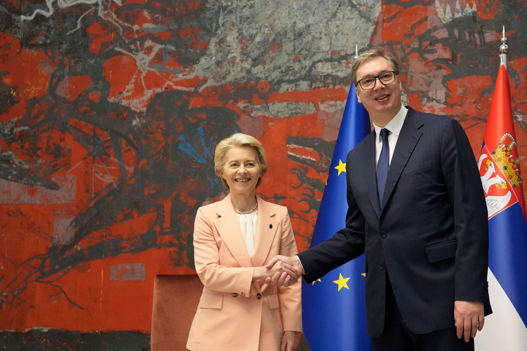 FILE - European Commission President Ursula von der Leyen, center, shakes hands with Serbian President Aleksandar Vucic in Belgrade, Serbia, on Oct. 25, 2024. (AP Photo/Darko Vojinovic, File)