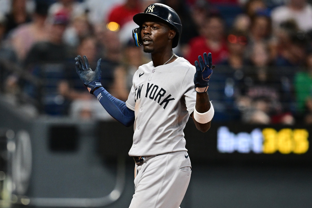 New York Yankees' Jazz Chisholm Jr. celebrates after hitting a solo home run off Cleveland Guardians relief pitcher Tim Herrin during the eighth inning of a baseball game, Tuesday, June 9, 2026, in Cleveland. (AP Photo/David Dermer)