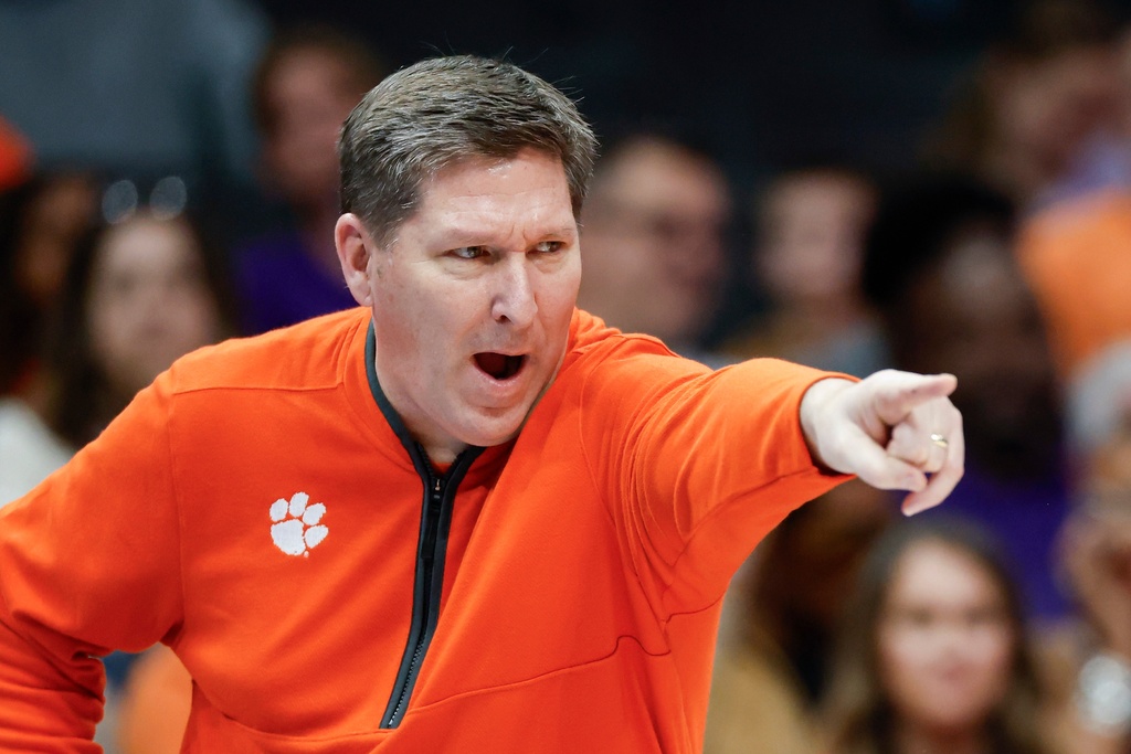 Clemson head coach Brad Brownell directs his team during the first half of an NCAA college basketball game against Duke in the semifinals of the Atlantic Coast Conference tournament in Charlotte, N.C., Friday, March 13, 2026. (AP Photo/Nell Redmond)
