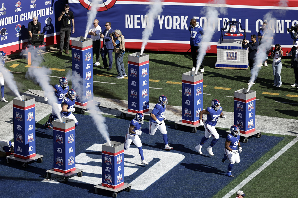 FILE - The New York Giants take the field to face the Philadelphia Eagles during an NFL football game, Oct. 20, 2024, in East Rutherford, N.J. (AP Photo/Adam Hunger, File)