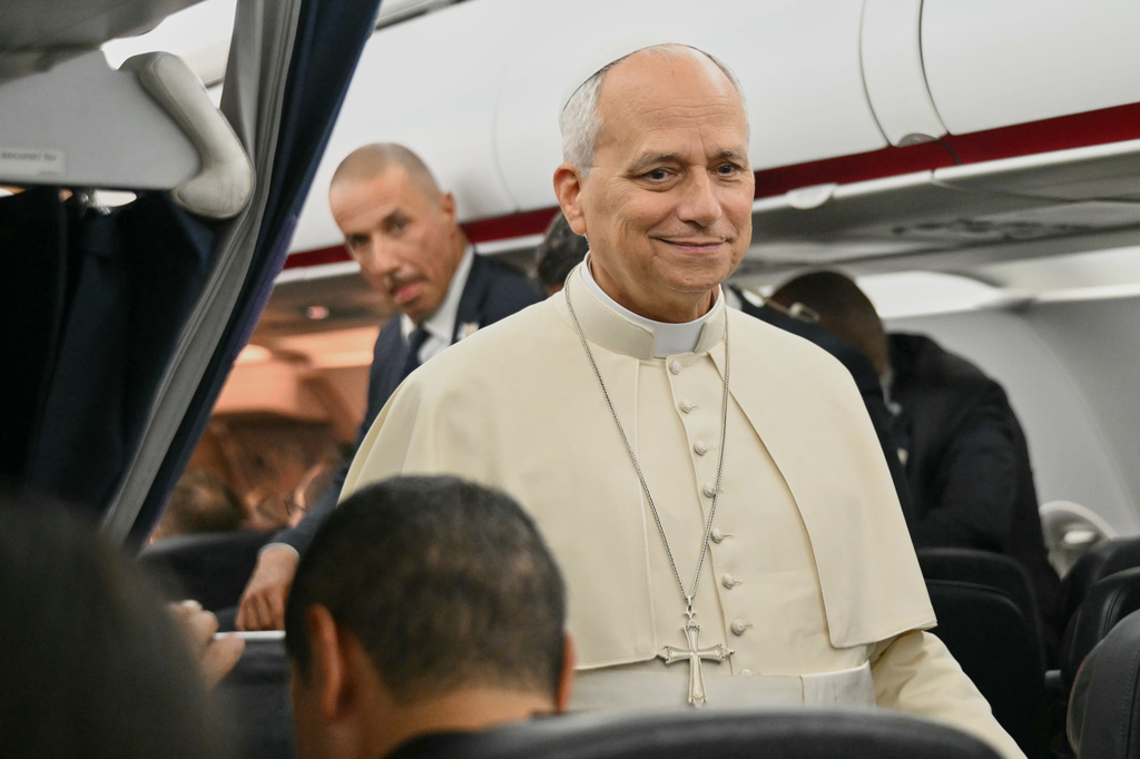 Pope Leo XIV speaks to journalists aboard the flight from Metz, France, to Rome, at the end of his four-day visit to France, Monday, Sept. 28, 2026. (Alberto Pizzoli/Pool Photo via AP)