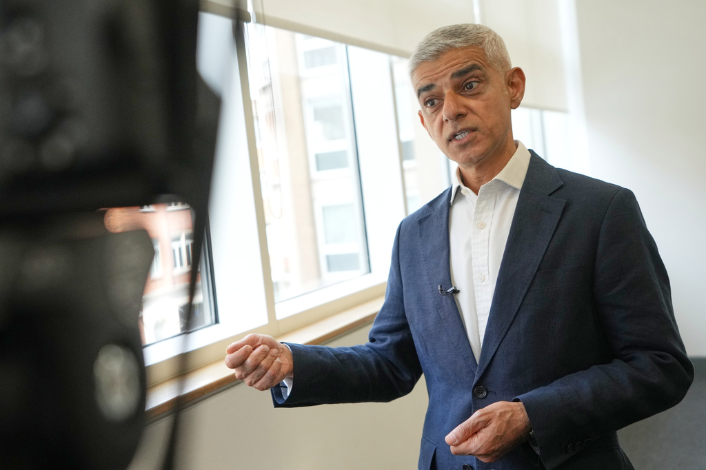 London Mayor Sadiq Khan, is interviewed after a walkabout through the borough of Camden in London, Thursday, July 23, 2026. (AP Photo/Kirsty Wigglesworth)