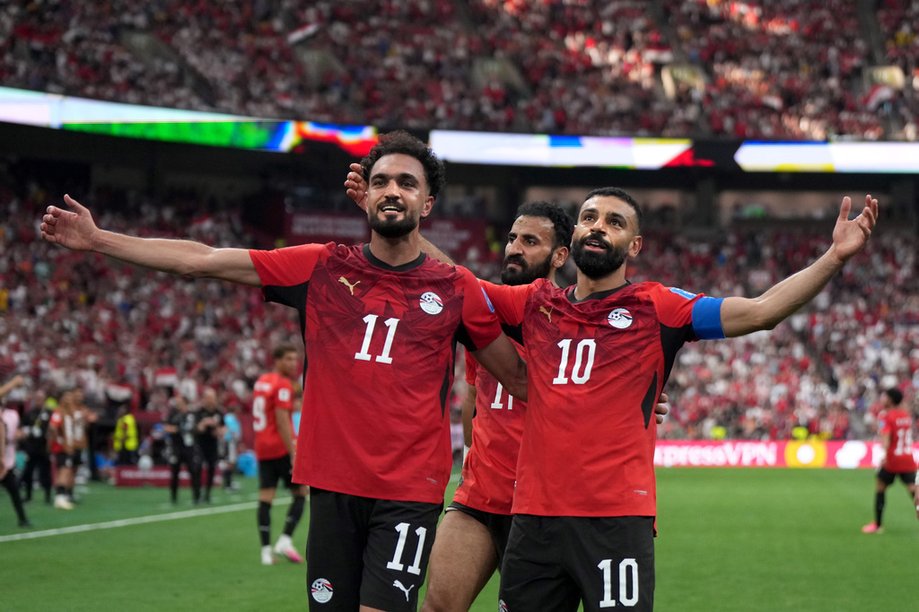 Egypt's Mohamed Salah (10) celebrates his goal with teammate Mostafa Ziko (11) during the World Cup Group G soccer match in Vancouver, British Columbia, Sunday, June 21, 2026. (Darryl Dyck/The Canadian Press via AP)