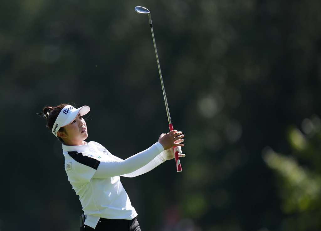 Miyu Yamashita, of Japan, watches her second shot on the 10th hole during the second round at the LPGA Canadian Women's Open golf tournament in Edmonton, Alberta, Friday, Aug. 21, 2026. (Darryl Dyck/The Canadian Press via AP)