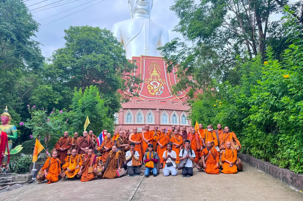 This photograph released by the Phu Manorom temple shows a group of Thai Buddhist monk posing for a picture at Phu Manorom temple in Mukdahan province, Thailand, Thursday, July 2, 2026 (Phu Manorom temple via AP)