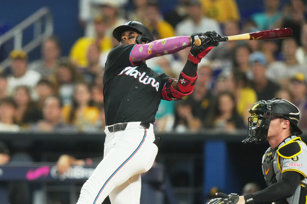 Miami Marlins' Esterury Ruiz hits a home run during the third inning of a baseball game against the Pittsburgh Pirates Tuesday, Aug. 11, 2026, in Miami. (AP Photo/Marta Lavandier)