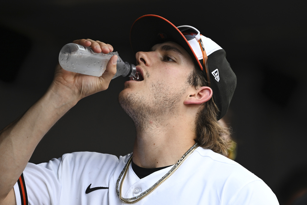 Baltimore Orioles third baseman Coby Mayo hydrates during a MLB baseball game, Wednesday, July 1, 2026 in Baltimore. (AP Photo/Gail Burton)