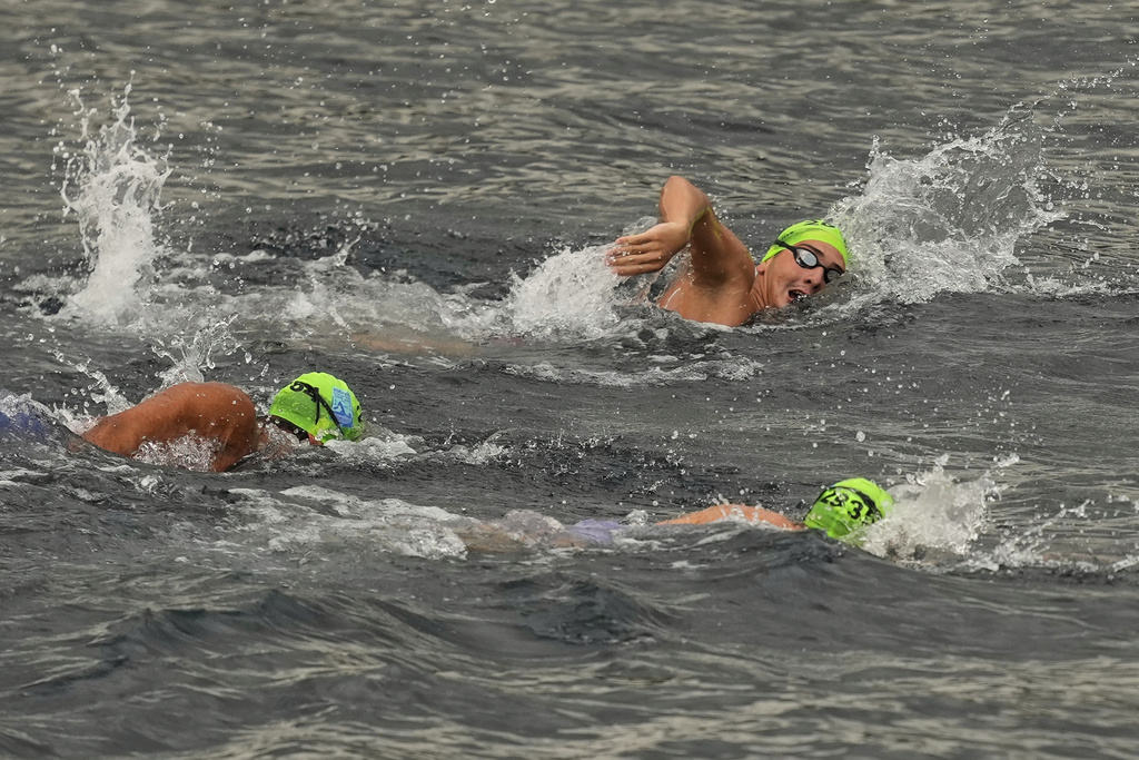 Competitors take part in a 6.5 km swimming race across the Bosphorus Strait, from the Asian side to the European side, in Istanbul, Turkey, Sunday, Aug. 24, 2025. (AP Photo/Khalil Hamra)