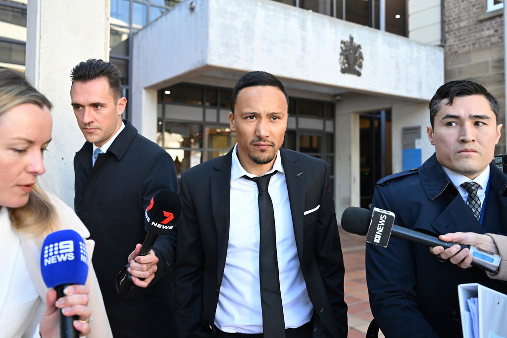 Macarthur FC player Kearyn Baccus, center, leaves at Campbelltown Local Court in Sydney, Thursday, May 30, 2024. (Dean Lewins/AAP Image via AP)