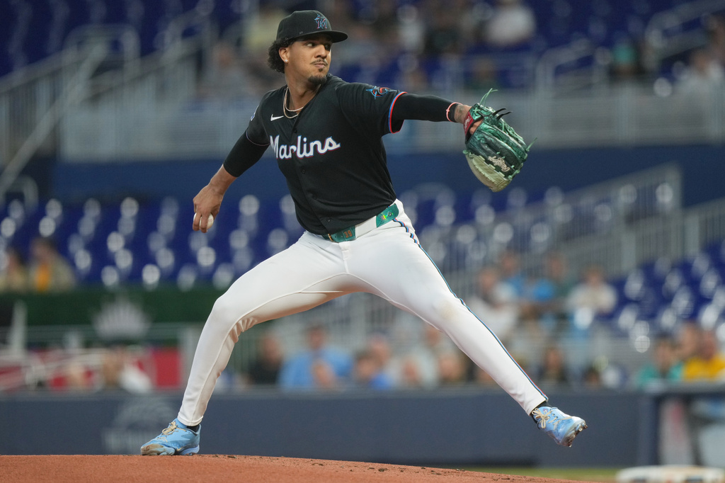 Miami Marlins starting pitcher Eury Perez aims a pitch during the first inning of a baseball game against the Pittsburgh Pirates Tuesday, Aug. 11, 2026, in Miami. (AP Photo/Marta Lavandier)