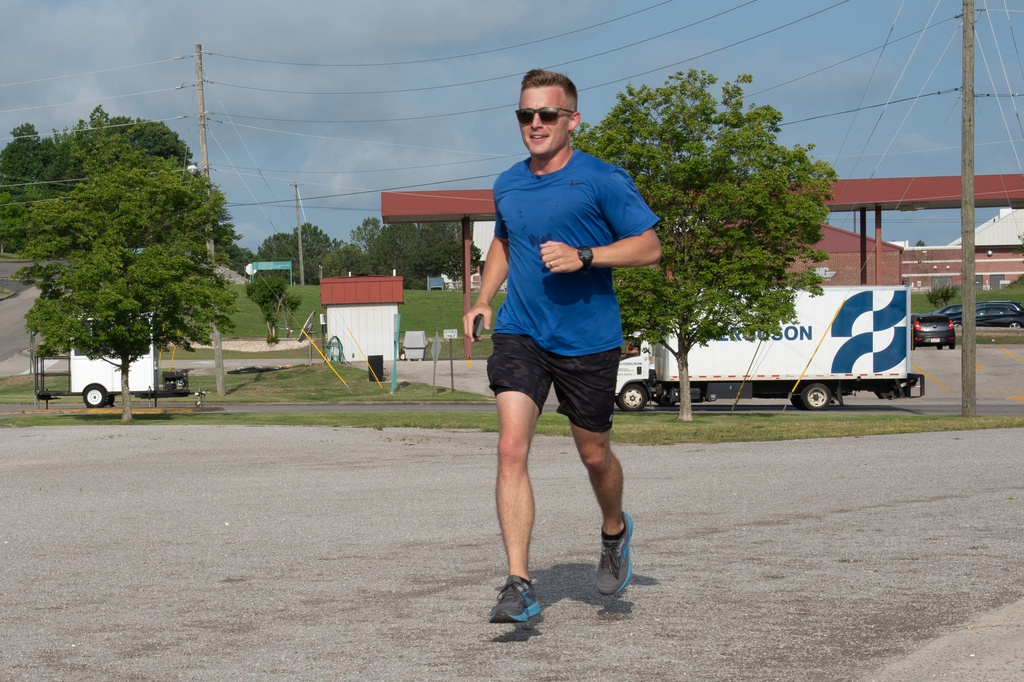 In this photo provided by the U.S. Air National Guard, U.S. Air Force Capt. Alex Klinner, operations flight commander for the 99th Air Refueling Squadron, completes another lap during the Shell 77 Memorial Run at Sumpter Smith Joint National Guard Base, Birmingham, Ala., May 2, 2025. (Paul Mann/U.S. Air National Guard via AP)