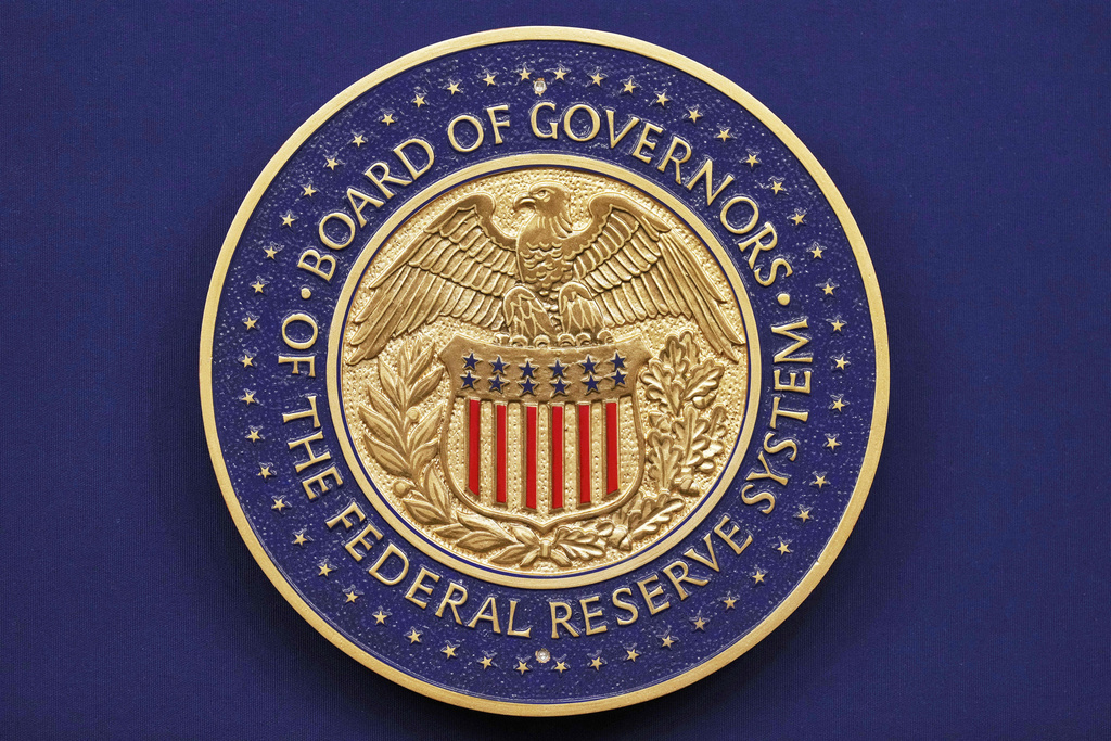 A seal is seen before Federal Reserve Chairman Jerome Powell walks out to speak during a news conference following the Federal Open Market Committee meeting, Wednesday, Sept. 17, 2025, at the Federal Reserve Board Building in Washington. (AP Photo/Jacquelyn Martin)