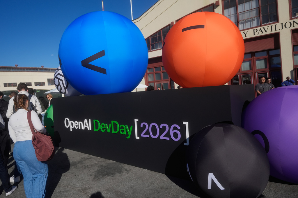 Visitors arrive for the OpenAI DevDay 2026 conference, Tuesday, Sept. 29, 2026, in San Francisco. (AP Photo/Jeff Chiu)