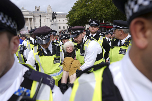 Police remove a protester taking part in a demonstration organised by Defend our Juries, in support of Palestine Action in Trafalgar Square, London Saturday Oct. 4, 2025. (Maja Smiejkowska/PA via AP) Police remove a protester taking part in a demonstration organised by Defend our Juries, in support of Palestine Action in Trafalgar Square, London Saturday Oct. 4, 2025. (Maja Smiejkowska/PA via AP)