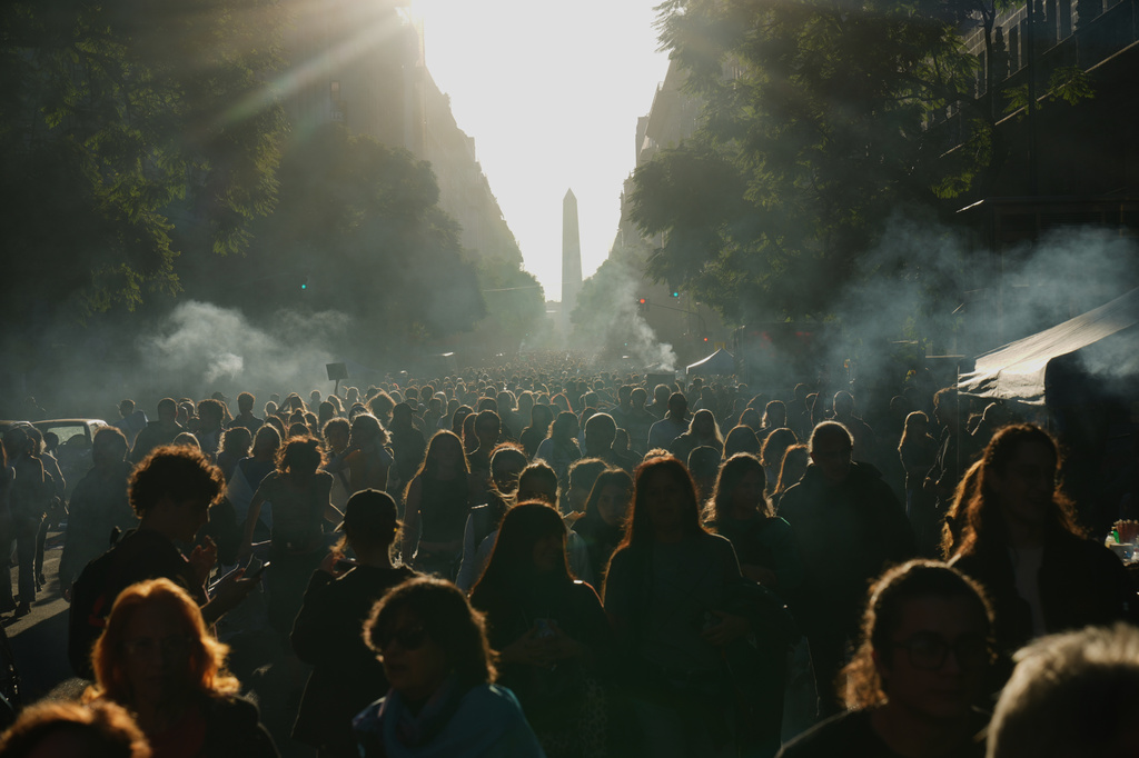 People protest to demand more funding for public universities in Buenos Aires, Argentina, Tuesday, May 12, 2026. (AP Photo/Rodrigo Abd)