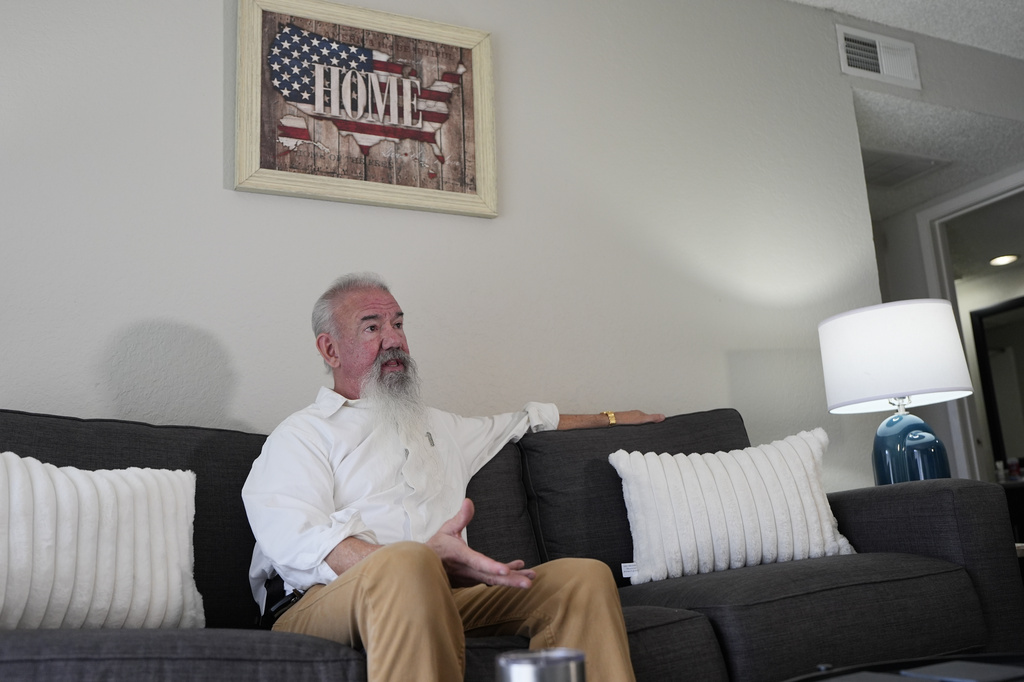Matthew Haines, owner of the Oakwood Apartments responds to questions during an interview at the community housing location in Arlington, Texas, Tuesday, March 17, 2026. (AP Photo/Tony Gutierrez)