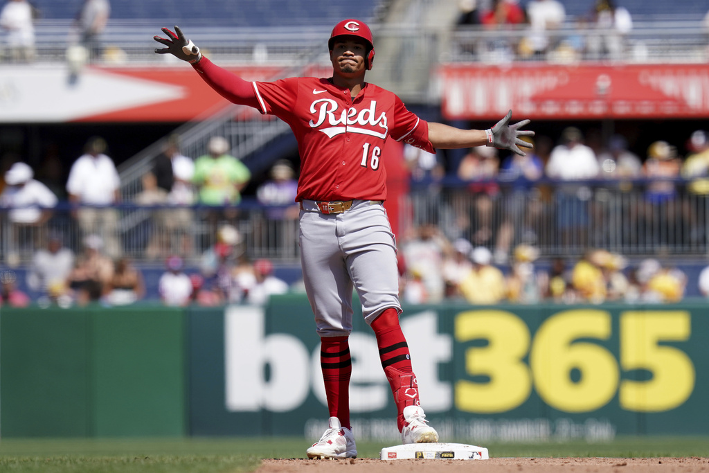 Cincinnati Reds' Noelvi Marte celebrates after hitting an RBI ground rule double during the sixth inning of a baseball game against the Pittsburgh Pirates, Sunday, Aug. 10, 2025, in Pittsburgh. (AP Photo/Matt Freed)