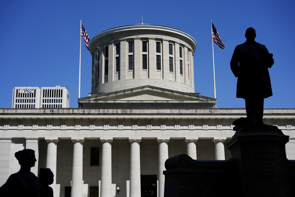 FILE - The William McKinley Monument is silhouetted near the Ohio Statehouse, April 15, 2024, in Columbus, Ohio. (AP Photo/Carolyn Kaster, File)