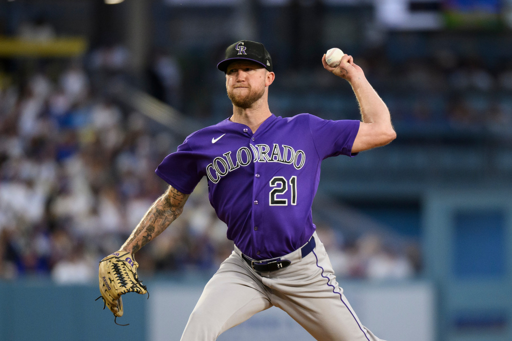 Colorado Rockies starting pitcher Kyle Freeland delivers during the third inning of a baseball game against the Los Angeles Dodgers in Los Angeles, Monday, July 6, 2026. (AP Photo/Kyusung Gong)
