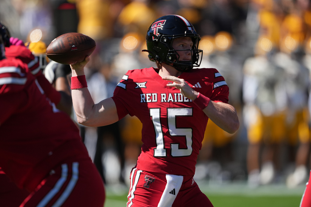 Texas Tech quarterback Will Hammond looks to throw the ball against Arizona State in the first half of an NCAA college football game, Saturday, Oct. 18, 2025, in Tempe, Ariz. (AP Photo/Rick Scuteri)