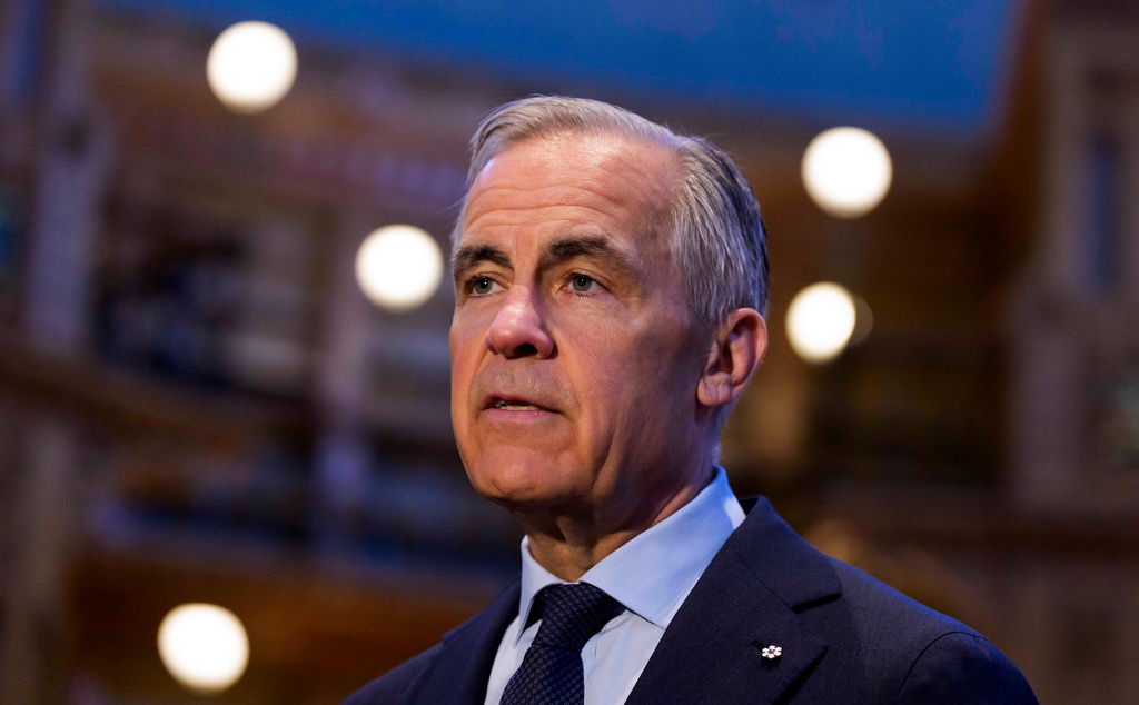 Prime Minister Mark Carney makes a statement in the Library of Parliament in Centre Block on Parliament Hill, in Ottawa, on Friday, May 22, 2026. (Justin Tang/The Canadian Press via AP)