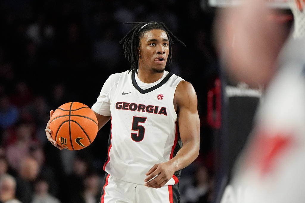 Georgia guard Jeremiah Wilkinson (5) dribbles the ball in the first half during an NCAA college basketball game against Mississippi, Wednesday, Jan. 14, 2026, in Athens, Ga. (AP Photo/Brynn Anderson)