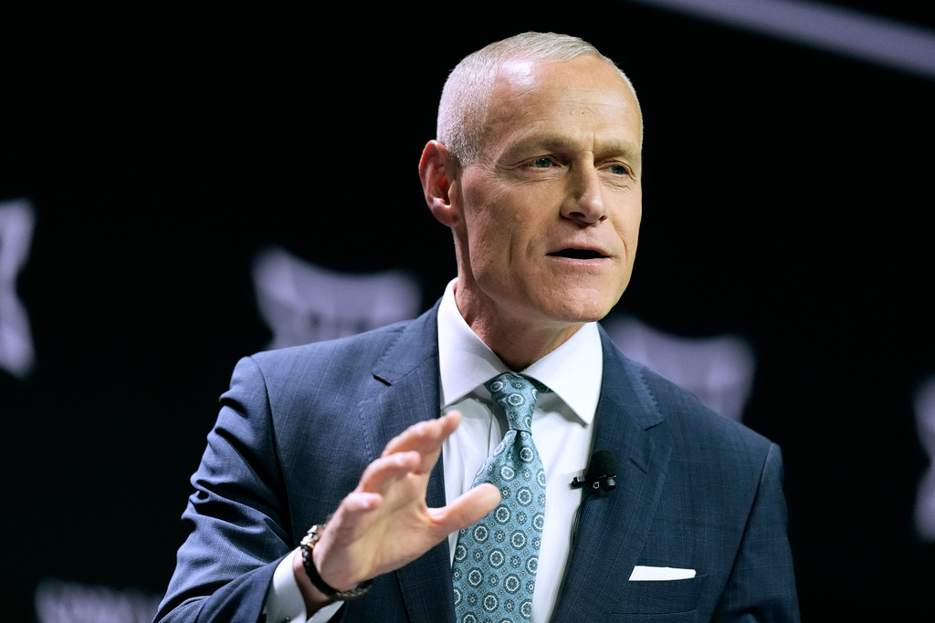 FILE - Big 12 Commissioner Brett Yormark addresses the media during the NCAA college Big 12 women's basketball media day, Oct. 22, 2024, in Kansas City, Mo. (AP Photo/Charlie Riedel, File)