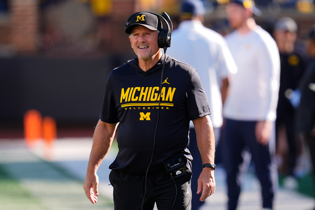 Michigan head coach Kyle Whittingham watches against Iowa during the first half of an NCAA college football game in Ann Arbor, Mich., Saturday, Sept. 26, 2026. (AP Photo/Paul Sancya)