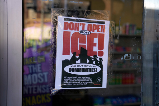 FILE - A sign regarding the U.S. Immigration and Customs Enforcement is posted on the window of a corner store on the day of President Trump's Inauguration, Jan. 20, 2025, in the predominantly Latino Little Village neighborhood Chicago. (AP Photo/Erin Hooley, File) FILE - A sign regarding the U.S. Immigration and Customs Enforcement is posted on the window of a corner store on the day of President Trump's Inauguration, Jan. 20, 2025, in the predominantly Latino Little Village neighborhood Chicago. (AP Photo/Erin Hooley, File)