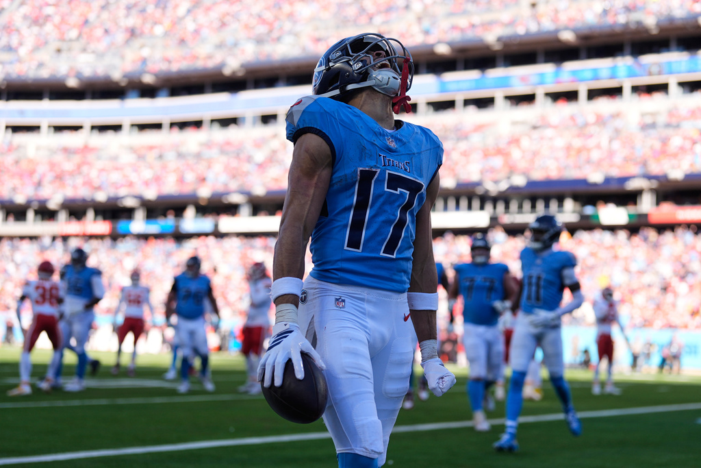 Tennessee Titans wide receiver Chimere Dike celebrates after scoring a touchdown during the first half of an NFL football game against the Kansas City Chiefs, Sunday, Dec. 21, 2025, in Nashville, Tenn. (AP Photo/George Walker IV)