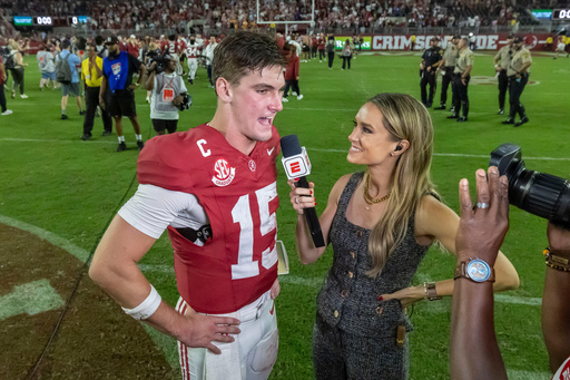 Alabama quarterback Ty Simpson (15) talks with ESPN's Molly McGrath, right, after his team's win over Tennessee in an NCAA college football game, Saturday, Oct. 18, 2025, in Tuscaloosa, Ala. (AP Photo/Vasha Hunt) Alabama quarterback Ty Simpson (15) talks with ESPN's Molly McGrath, right, after his team's win over Tennessee in an NCAA college football game, Saturday, Oct. 18, 2025, in Tuscaloosa, Ala. (AP Photo/Vasha Hunt)