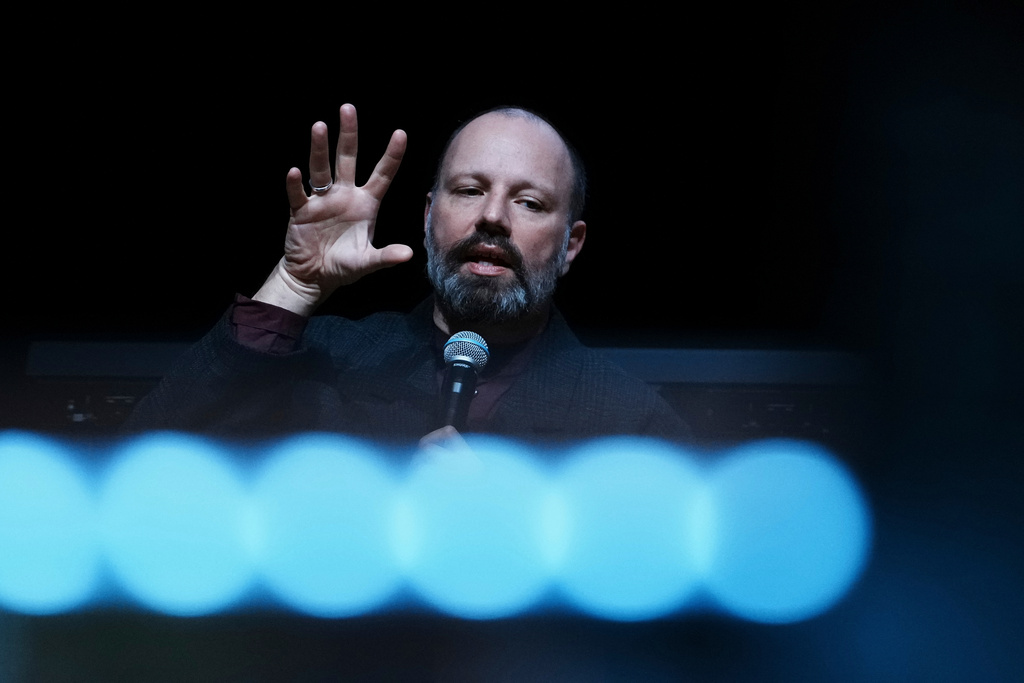 Oscar nominated director Yorgos Lanthimos speaks to reporters at the inauguration of an exhibition of his photographs at Onassis Stegi in Athens, Greece, on Friday, March 6, 2026. (AP Photo/Thanassis Stavrakis)