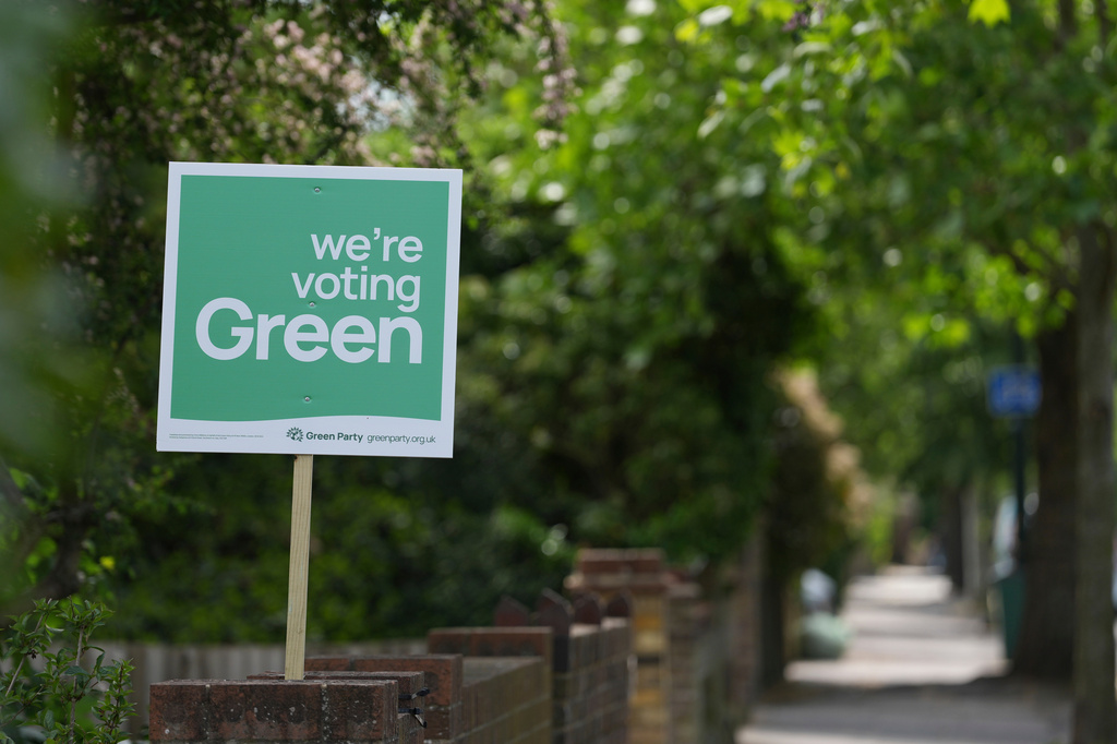 A Green Party political sign put up by the householder to show support ahead of local council elections in London, Wednesday, May 6, 2026. (AP Photo/Alastair Grant)