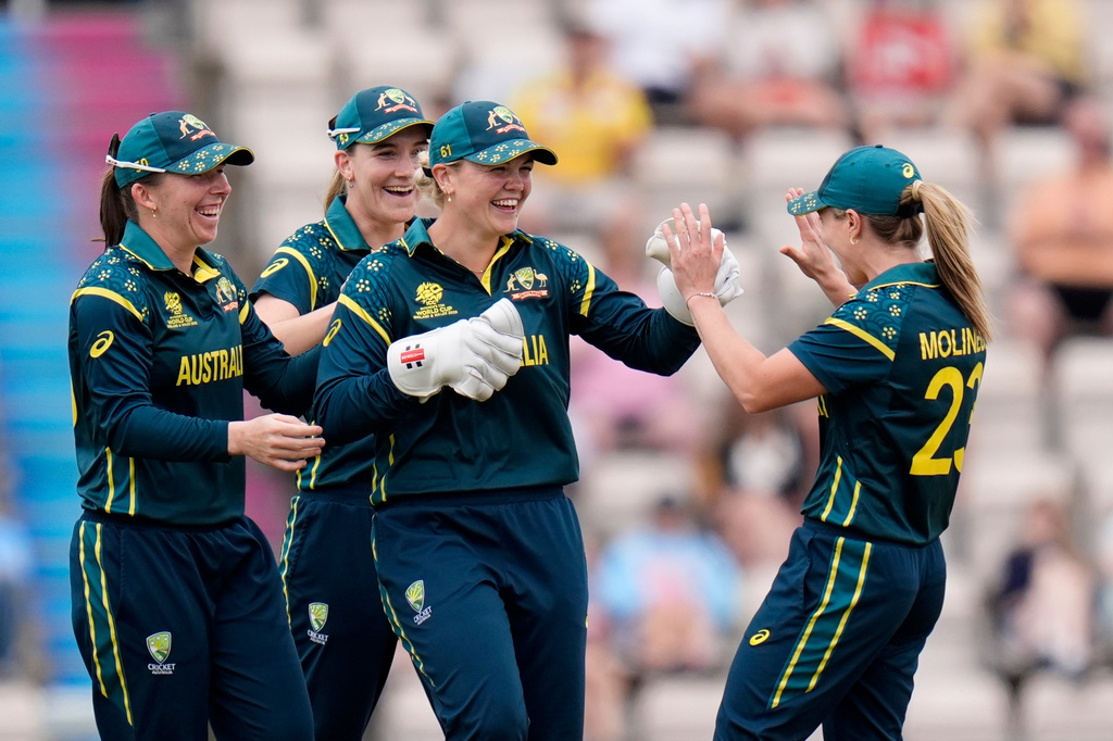 Georgia Voll of Australia, second left, celebrates the wicket of Phebe Molkenboer of the Netherlands during the Women's T20 World Cup match between Australia and Netherlands in Southampton, England, Saturday June 20, 2026. (Andrew Matthews/PA via AP)