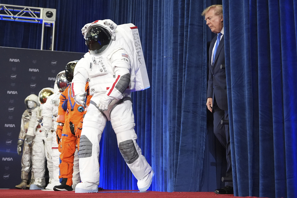 President Donald Trump arrives at an event to present the Congressional Space Medal of Honor to Artemis II crew members, Friday, Aug. 28, 2026, at Johnson Space Center in Houston. (AP Photo/Mark Schiefelbein)
