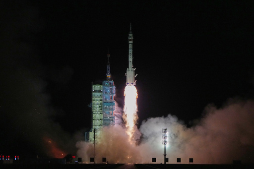 China's Long March 2F rocket, carrying three astronauts for the Shenzhou 21 manned space mission, lifts off for a space station, at the Jiuquan Satellite Launch Center in Jiuquan, northwestern China, Friday, Oct. 31, 2025. (AP Photo/Andy Wong) China's Long March 2F rocket, carrying three astronauts for the Shenzhou 21 manned space mission, lifts off for a space station, at the Jiuquan Satellite Launch Center in Jiuquan, northwestern China, Friday, Oct. 31, 2025. (AP Photo/Andy Wong)