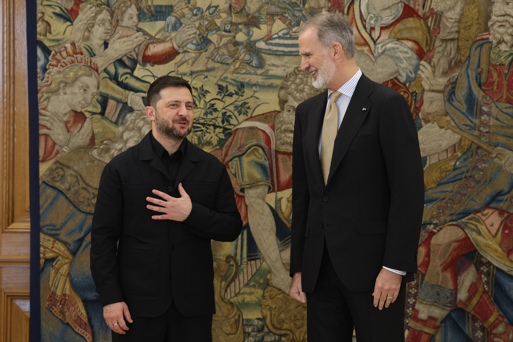 Ukrainian President Volodymyr Zelenskyy is received by Spain's King Felipe VI during a meeting in Madrid, Spain, Tuesday, Nov. 18, 2025. (Alejandro Martinez Velez/Europa Press via AP) **SPAIN OUT**