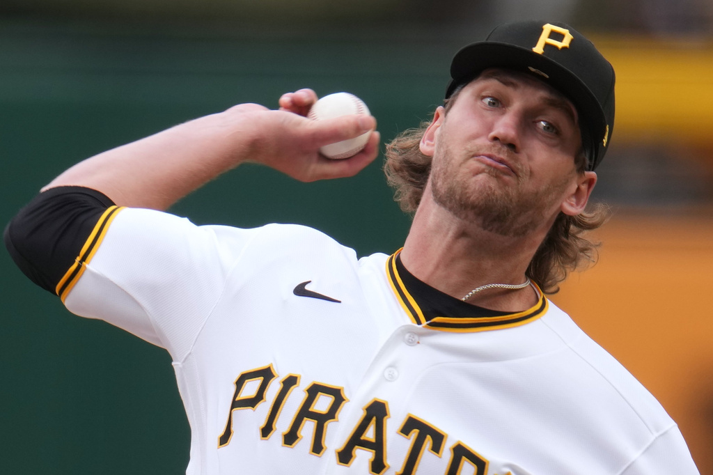 Pittsburgh Pirates pitcher Braxton Ashcraft delivers during the first inning of a baseball game against the Baltimore Orioles in Pittsburgh, Sunday, April 5, 2026. (AP Photo/Gene J. Puskar)