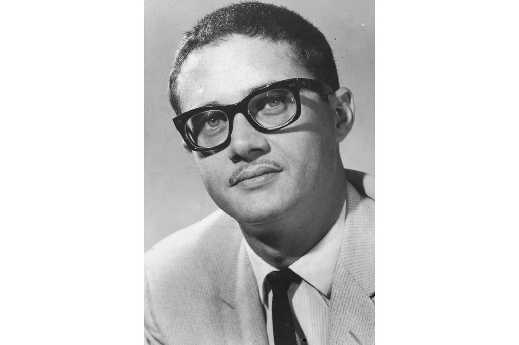 This 1964 photo shows political cartoonist Pat Oliphant. (The Denver Post via AP)