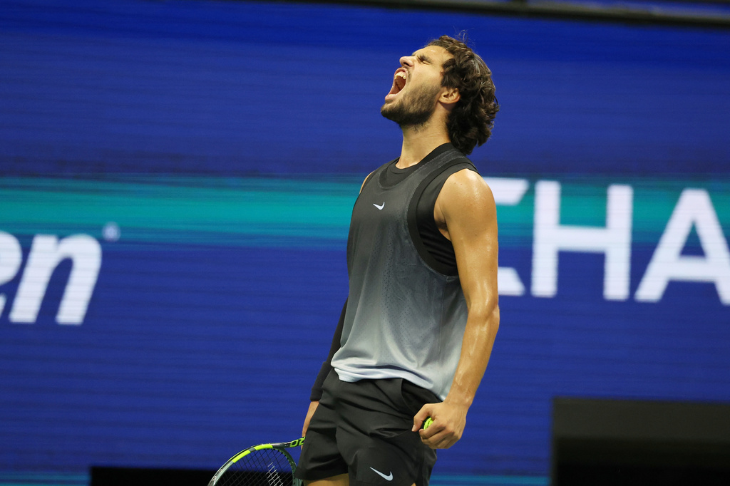 Carlos Alcaraz, of Spain, celebrates after a point in the fifth set against Ben Shelton, of the United States, during the quarterfinal round of the U.S. Open tennis championships, early Wednesday, Sept. 9, 2026, in New York. (AP Photo/Heather Khalifa)