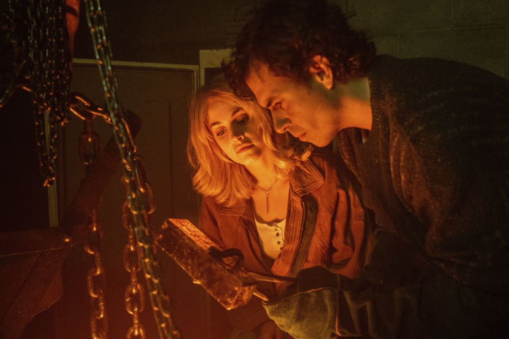 This image released by PBS Masterpiece shows Stefanie Martini, left, and Tom Cullen in a scene from "The Gold." (Sally Mais/All3Media and Masterpiece via AP)