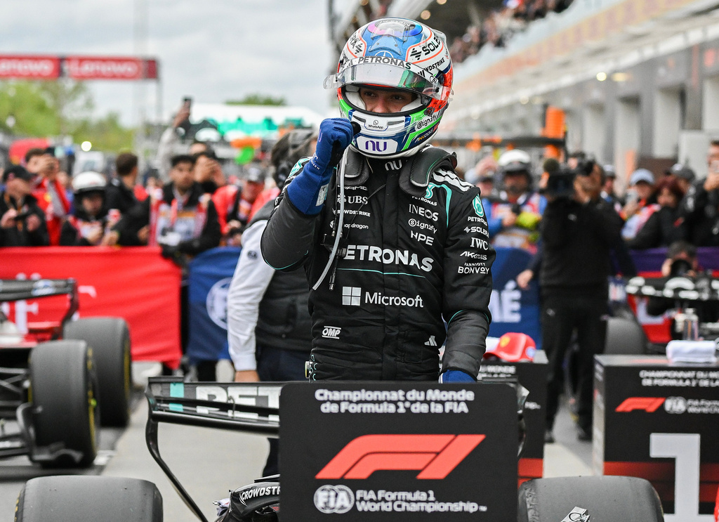 Mercedes driver Kimi Antonelli, of Italy, celebrates after winning the F1 Canadian Grand Prix auto race in Montreal, Sunday, May 24, 2026. (Graham Hughes/The Canadian Press via AP)