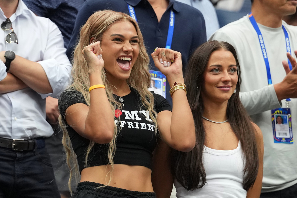 Soccer player Trinity Rodman celebrates after her boyfriend Ben Shelton, of the United States, won his match against Hubert Hurkacz, of Poland, during the second round of the U.S. Open tennis championships Wednesday, Sept. 2, 2026, in New York. (AP Photo/Kirsty Wigglesworth)