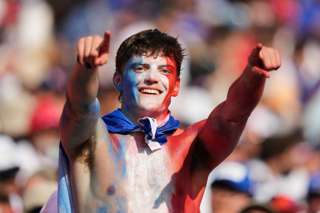 A fan cheers France on during the World Cup quarterfinal soccer match between France and Morocco in Foxborough, Mass., near Boston, Thursday, July 9, 2026. (AP Photo/Stephanie Scarbrough)